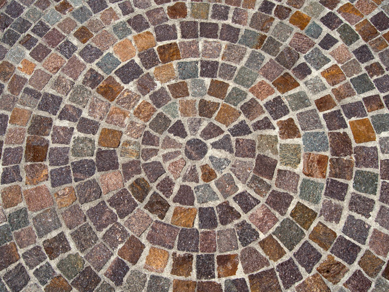 porphyr mosaik pflastersteine im rundbogen verlegt